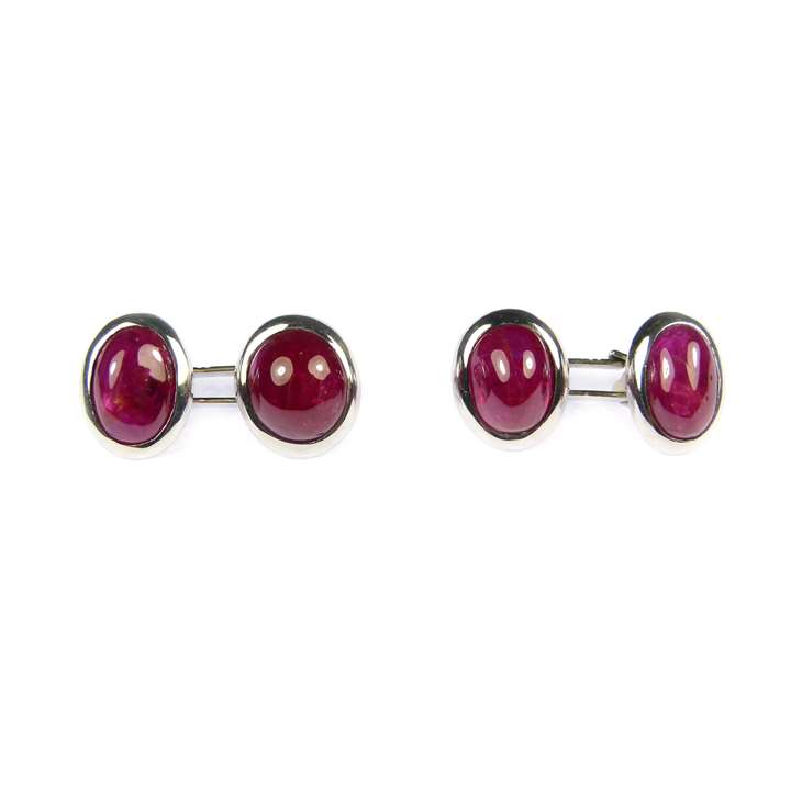 Pair of oval cabochon ruby and platinum cufflinks